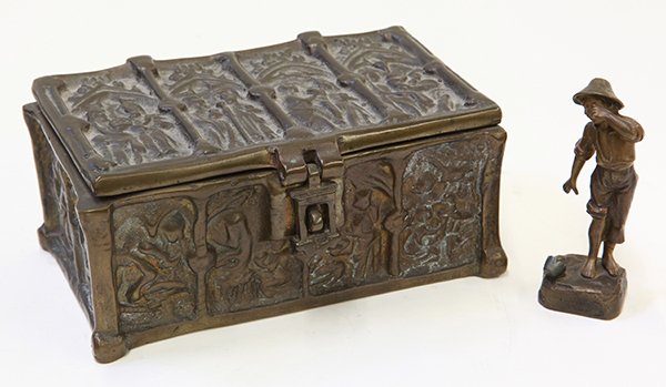 English bronze lidded casket in the Neo-Gothic taste: (lot of 2) English bronze lidded casket in the Gothic taste, possibly 18th century, having arched cartouche with low relief genre scenes, 2.5"h x 5.5"w x 3'd; together with a bronze figure of a peasan