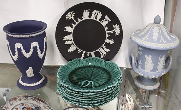 Associated Wedgwood porcelain: (lot of 11) Associated Wedgwood porcelain, consisting of a dark blue Jasperware urn form vase, 8"h x 5"dia. a Wedgwood blue Jasperware covered urn with handles, and a black Jasperware plate; together