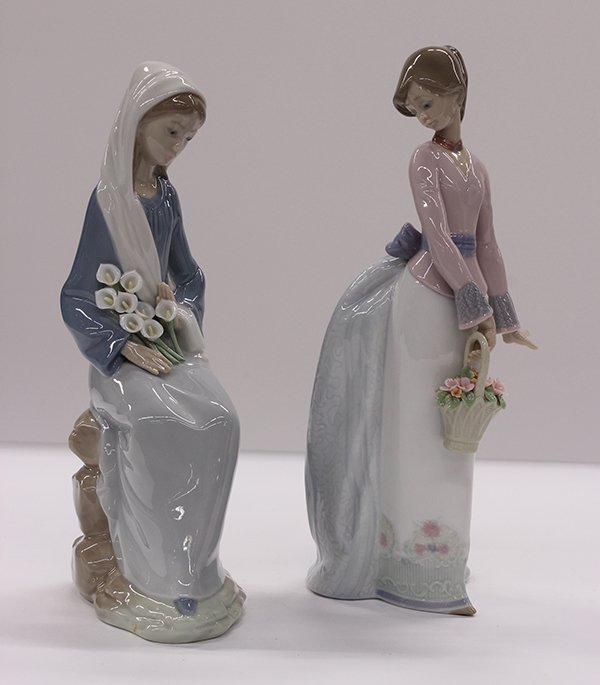 Lladro porcelain figural groups: (lot of 2) Lladro porcelain figural groups, consisting of "Basket of Love", #7622, and "Girl with Lillies", #4972, tallest: 9.5"h