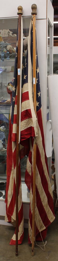 Pair of Fifty star American flags: (lot of 2) Pair of Fifty star American parade flags, each on a pole, 73"h. Provenance: The Jeff Sahadi collection