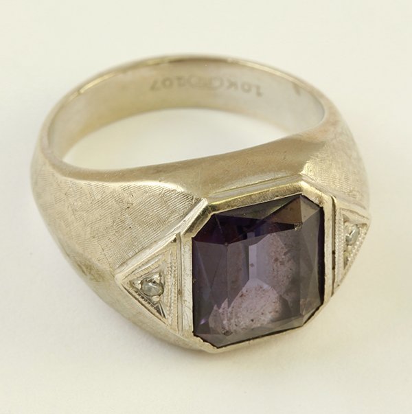 Vintage synthetic sapphire diamond ring: Vintage synthetic sapphire and diamond ring featuring one rectangular cut synthetic sapphire set in a diamond accented mounting, size 9 1/2, 10.3 grams