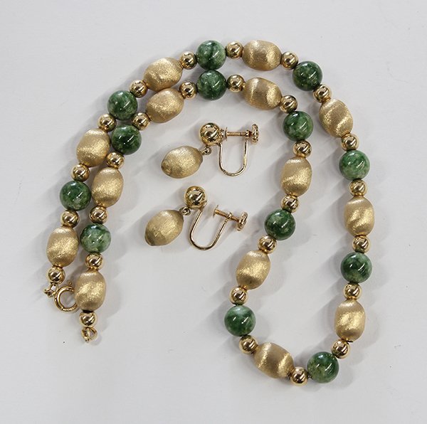 Chalcedony bead necklace and earring set: Chalcedony, 14k yellow gold bead necklace and matching earrings featuring a necklace composed of round green chalcedony beads alternated by 14k yellow gold, bright and satin textured beads, length 15