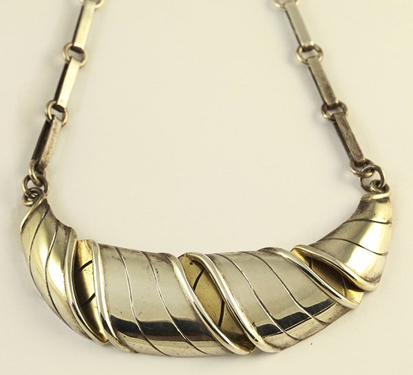 William Spratling "Croissant" sterling silver necklace: William Spratling "Croissant" sterling silver necklace featuring a central overlapping ribbon motif attached to bar and cable links, stamped William Spratling 925, 17 inches long, 66.6 grams
