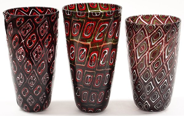 (lot of 3) Art glass vases by Michael Nourot (American: (lot of 3) Art glass vases by Michael Nourot (American b.1949), circa 1980, each vase of cylindrical form with a slightly flared rim, having repeating geometric patterns executed in the Venetian murri