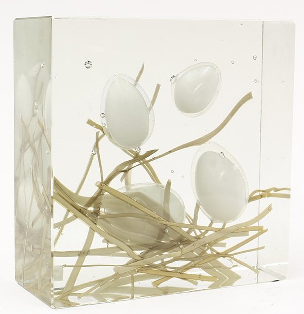 Alfredo Barbini Murano glass block sculpture: Alfredo Barbini Murano glass block sculpture for Pauly, circa 1955, the clear block form suspending three captured blown glass eggs, surmounting the grassy base marked A. Barbini / Pauly, 8.5"h x 8.5"