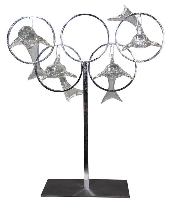 'Dauphins Jouant' sculpture by Daum: 'Dauphins Jouant' sculpture by Daum, Nancy, 1970, executed in crystal and chromed metal, also called 'The Five Rings of the Olympics," having four crystal dolphins seeming to jump through the rings of