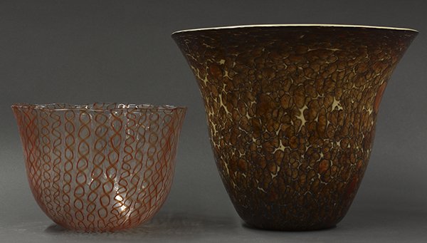 Michael Cohn, Michael Nourot hand-blown art glass: (lot of 2) Art glass vases consisting of a Michael Cohn Tortoise Shell Series hand blown center bowl having a flaring neck set on a tapered body, retaining label, 9"h x 11.5"w; together with a Michael