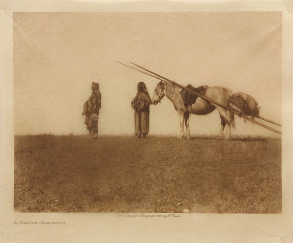 Photogravure, Edward Sheriff Curtis, Atravois-Blackfoot: Edward Sheriff Curtis (American, 1868-1952), "Atravois-Blackfoot," photogravure on rice paper, from E.S. Curtis photograph from 1926, paper: 6.5"h x 8"w, overall (with frame): 21"h x 17"w