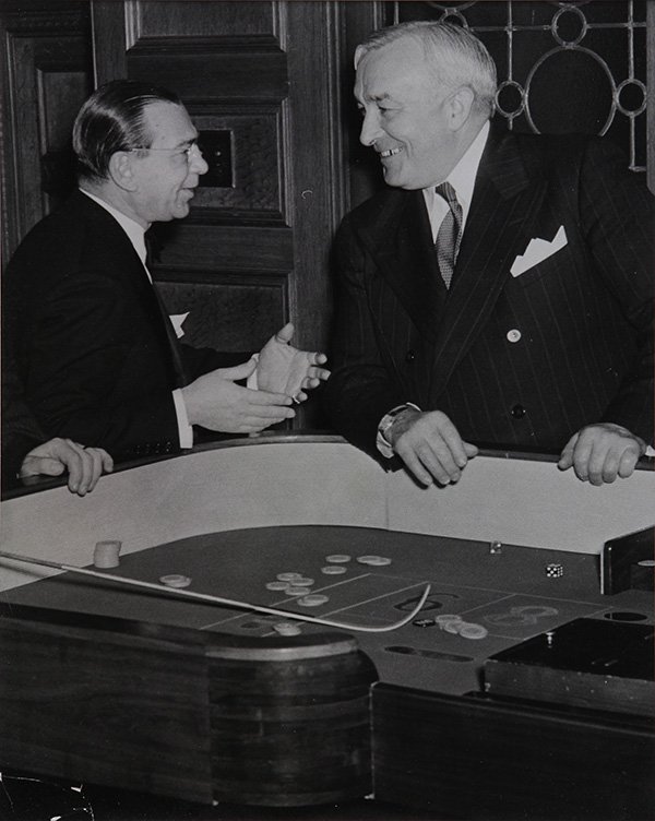 Photograph, Weegee, George Herrick & Michael Murphy: Weegee (American, 1899-1968), "George Herrick & Michael Murphy," gelatin silver print, artist stamp verso, titled verso, sheet (unframed): 10.125"h x 8.125"w, overall (with mat) 20"h x 16"w. Provenanc