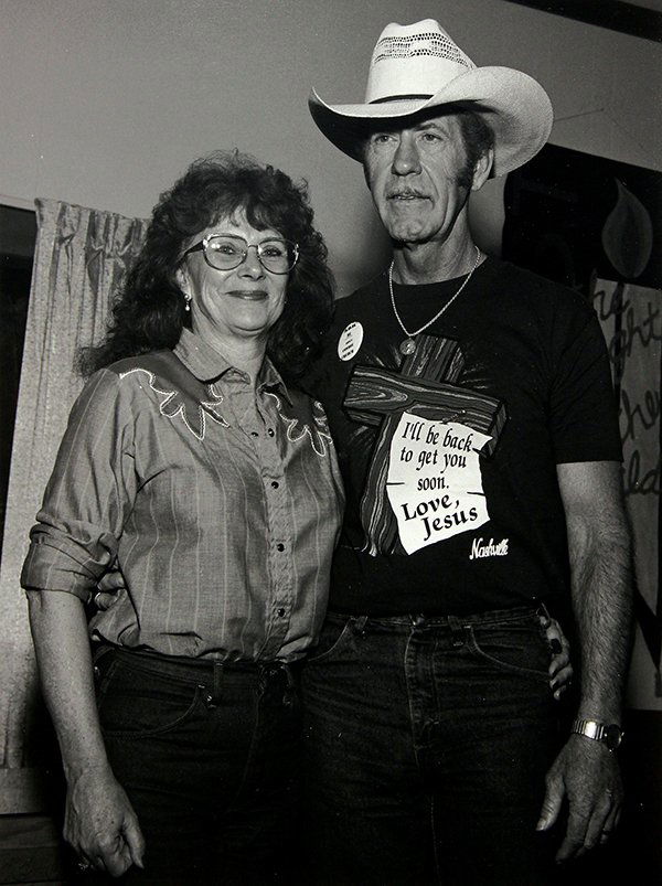 Photographs by Rhondal McKinney: (lot of 2) Rhondal McKinney (American, 20th century), "1st Runner-up, Miss Farmer City," 1996, and "John & Suzy Deeton, Farmer City," 1997, gelatin silver prints, each titled, signed and dated verso,