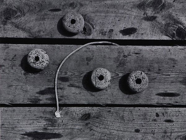 Photograph, Aaron Siskind, Gloucester 10: Aaron Siskind (American, 1903-1991), "Gloucester 10 (1944)," gelatin silver print, signed, dated and titled in pencil verso, later reprint, sheet (unframed): 11"h x 14"w, overall (with mat): 16"h x 20