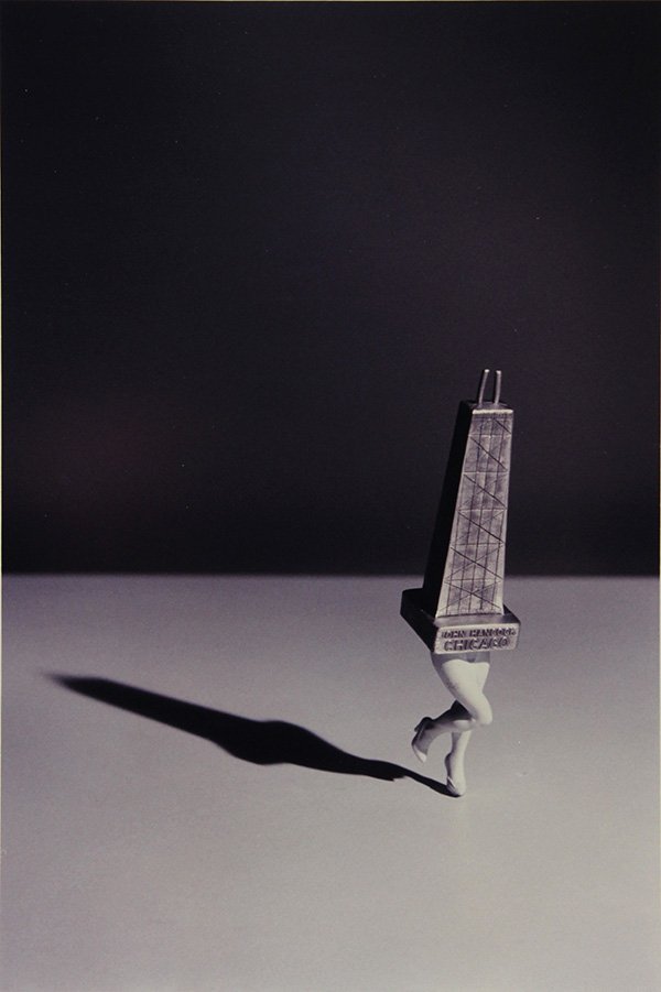 Photograph, Laurie Simmons, Walking John Hancock: Laurie Simmons (American, b. 1949), "Walking John Hancock (Chicago)," 1992, Ektacolor print, signed, dated and titled verso, artist title stamp verso, edition 20/200 sheet: 14"h x 11"w. Provenance: Th