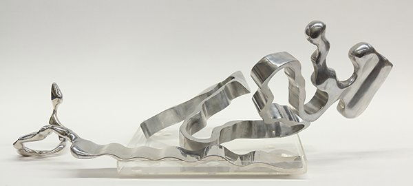 Sculpture, Steven Urry, Ribbon Arrow, 1970: (lot of 2) Steven Urry (American, b. 1939), "Ribbon Arrow," 1970, aluminum sculpture, one signed "Urry", dated and titled, overalls: 14.5"h x 22"w x 11.5"d/7"h x 23.75"w x 9"d. Provenance: The David C