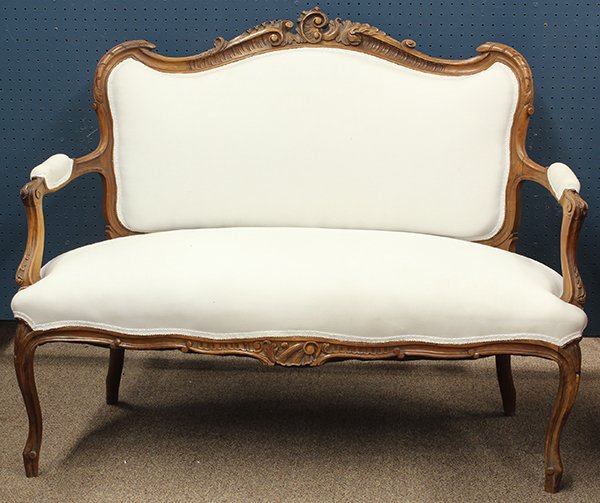 Louis XV style parlor suite: (lot of 5) Louis XV style parlor suite, each having a rocaille carved crest continuing to the outswept arms and rising on cabriole legs, comprising of a settee, 38.75"h x 47"w x 18"d; two armchairs, 3