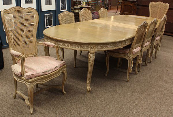 Louis XV style dining suite: Louis XV style dining suite, consisting of an extension dining table with five 14.75" leaves, accented with a carved apron, and rising on acanthus decorated cabriole legs (refinished) 30"h x 11'4" x 5