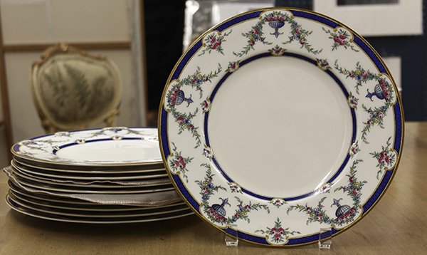 Royal Worcester 'Rosemary' service plates: (lot of 11) Royal Worcester 'Rosemary' service plates, each having a floral swag and urn decorated border on a white ground, verso with black pottery mark, 10.5"w