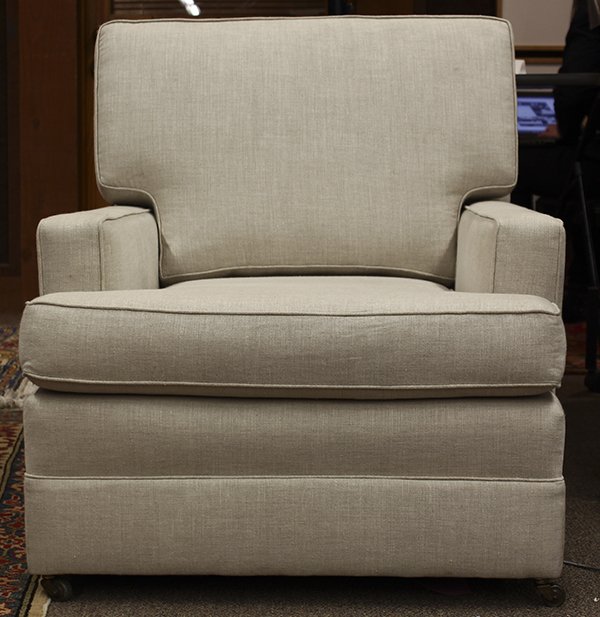 Rare custom design Paul Frankl lounge chair: Rare custom design Paul Frankl lounge chair, circa 1930, executed in Calvin white linen over a custom built wood frame with original casters, 31.5" h x 29"w x 16.25"d
