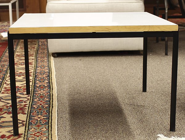 Florence Knoll "VKG" occassional table: Florence Knoll "VKG" occassional table, having a white laminate top with beech veneer edge, and rising on an angle iron base, 16"h x 24"dia.