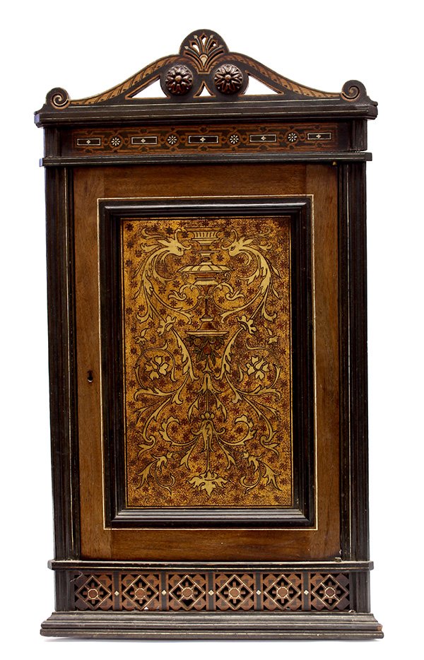 Contenintal wall hanging corner cabinet: Contenintal wall hanging corner cabinet, circa 1900, the single door case having a polychrome decorated panel surmounting the pierced apron, terminating at the molded base, 31"h x 17"w