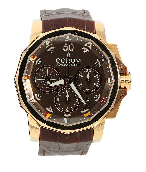 Gentleman's Corum Admiral's Cup rose gold wristwatch,: Gentleman's Corum "Admiral's Cup" chronograph 18K rose gold wristwatch, Ref. 010023 having a bronze dial, chrono and seconds subsidiary dials, date at 5, Nautical flags, 27 jewel Swiss chronograph, ce