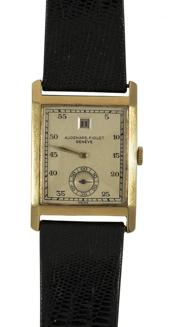 Rare Audemars Piguet jump hour 18k yellow gold: Rare Audemars Piguet jump hour 18k yellow gold rectangular wristwatch, No. 39811, Circa 1929 having a silvered matte dial, minute railroad track in black, subsidiary seconds dial, yellow gold minute h