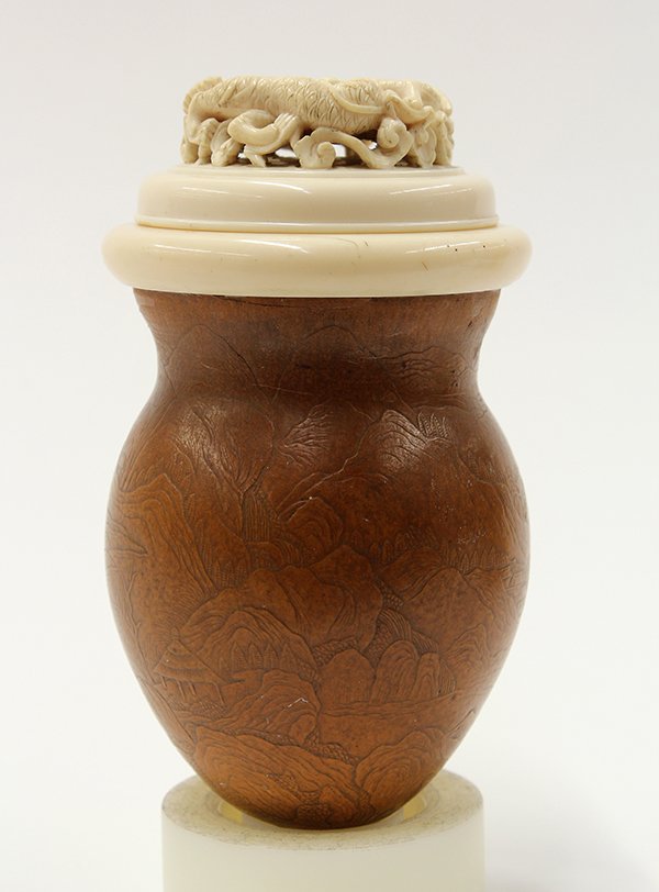 Chinese Gourd Cricket Cage with Landscape: Chinese gourd cricket cage,19th/20th century, the body molded with a mountain landscape and a river with a figure fishing on a boat, the domed lid pierced with a dragon and phoenix, 4.375"h; Provenanc