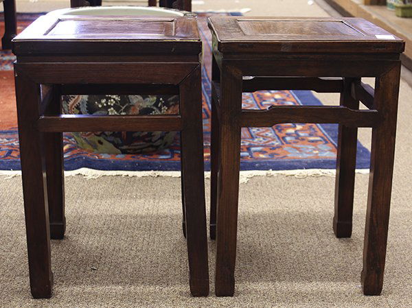 Two Chinese Wood Square Stools: (lot of 2) Chinese hardwood square top stools, the upper part inset with a floating panel framed within a plain edge, with a plain apron and straight supports braced by stretchers, 20"h x 13.125" w x