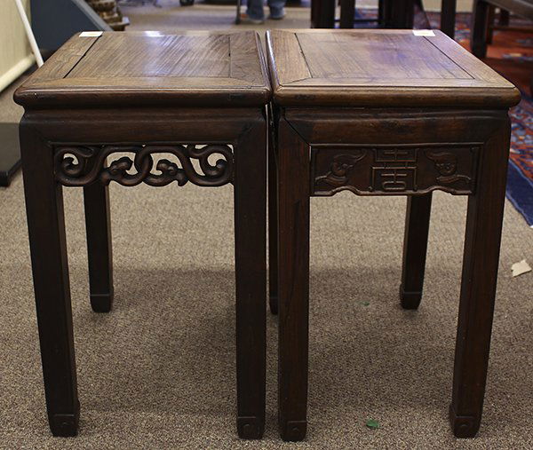 Chinese Rectangular Wood Stools: (lot of 2) Chinese hardwood rectangular stools, one fronted by a shaped apron carved with a pair of bats flanking a shou character, raised on straight supports with hoof terminals; the other carved wi