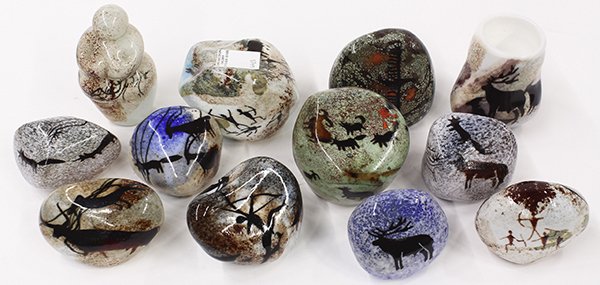Signed Ophir Studios art glass: (lot of 12) Signed Ophir Studios art glass, circa 1981, consisting of (1) vase, (1) figural piece in the style of the 'Venus' of Willendorf, and (10) rock forms, each cased in milk glass and decorated
