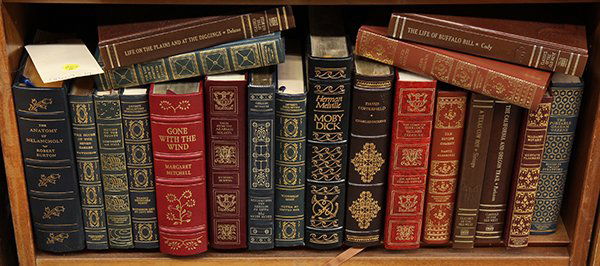 Leather bound classic literature: (lot of 20) Leather bound classic literature including Moby Dick, David Copperfield, The Complete Sherlock Holmes Treasury, Madame Bovary, and Gone With The End