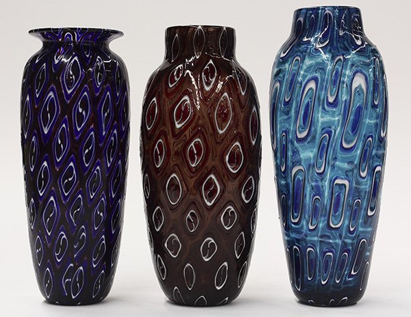 Art glass vases by Michael Nourot: (lot of 3) Art glass vases by Michael Nourot (American b.1949), circa 1980, each vase of cylindrical form, having repeating geometric patterns executed in the Venetian murrini technique, in multiple c