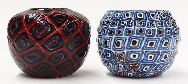 Art glass vases by Michael Nourot: (lot of 2) Michael Nourot (American b.1949) art glass vases, circa 1980, each vase of bulbous form, having repeating geometric patterns executed in the Venetian murrini technique, one having a teal bo