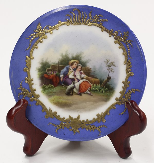 Scenic Old Paris Porcelain plaque: Scenic Old Paris Porcelain plaque, 19th century, the hand painted plaque centers a scene of idyllic farm life with a couple relaxing against a bale of hay flanked by a sheep and dog, having a slate bl