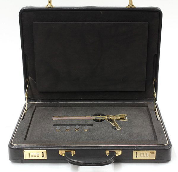 Sculpture, Hadrian Pigott: Hadrian Pigott (British, b. 1961), Business as Usual, 1996, mixed media sculpture with four photographs, overall: 3.5''h x 18''w x 13''d. Provenance: The David C. and Sarajean Ruttenberg Collection (C