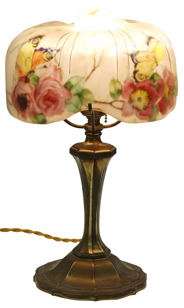 Pairpoint "Puffy" boudoir lamp: Pairpoint "Puffy" boudoir lamp, 1907, the draping linenfold shade with reverse painted decoration of butterflys and purple flowers, marked The Pairpoint Corp'n and Patented July 9, 1907, surmounting t