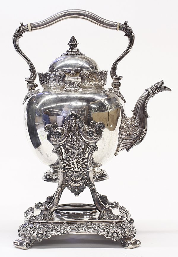 Tiffany & Company Victorian style sterling silver tea: Tiffany & Company Victorian style sterling silver tea kettle on stand, 1907-1947, the hot water pot mounted with an acanthus accented bail handle, and a pierced scroll and floral gallery surrounding t