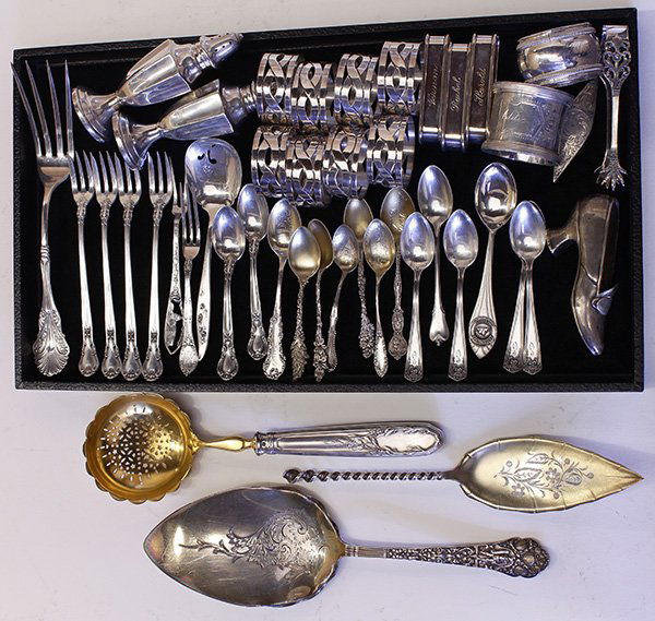 American sterling silver: (lot of 44) American sterling silver consisting of a Gorham "Medici" pattern pie server, 1880; Towle 128 floral engraved gilt server; together with seafood forks, souvenir and plain demitasse spoons,