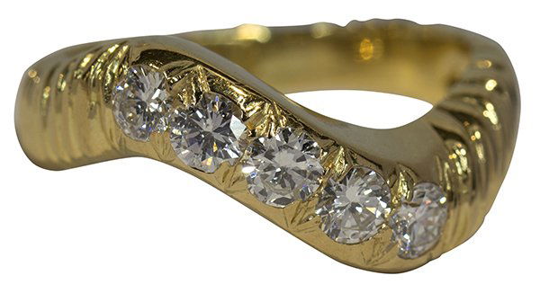 Van Cleef & Arpels diamond and yellow gold ring: Van Cleef & Arpels diamond and 18k yellow gold ring featuring a twisted band motif flush top, set with five round full cut diamonds, weighing in total approximately 0.67 ct., signed VCA, size 6 1/4, 5