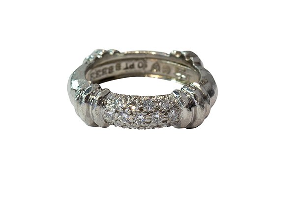 Henry Dunay diamond and platinum pave' band ring: Henry Dunay diamond and platinum ring set with thirteen full cut diamonds weighing in total approximately 0.39 ct., pave' set in a hammered platinum band mounting, signed Dunay B8533, size 5, 9.8 gram