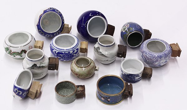 Chinese Group of Bird Feeders: (lot of 13) Group of Chinese bird feeders: ten porcelain, one celadon, two cloisonne, largest: 2.5"h