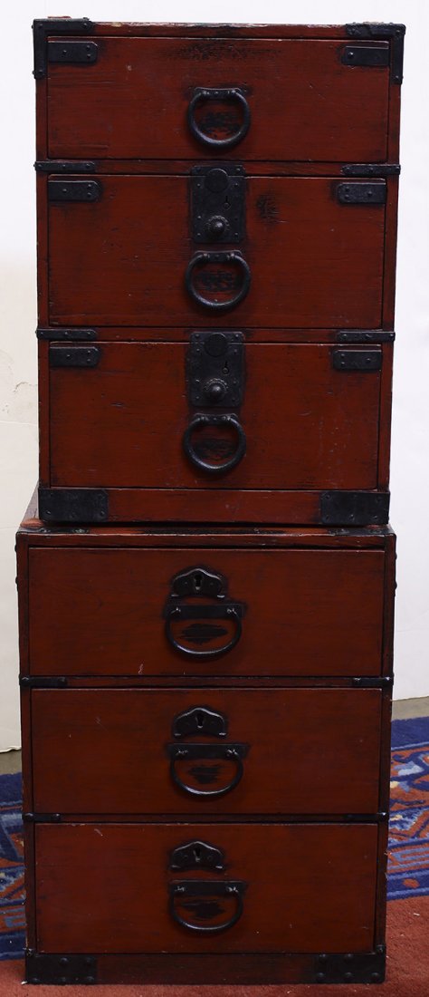 Japanese Negoro Lacquered Small Tansu Chests Edo Period: (lot of 2) Japanese negoro lacquered ko-dansu, the small chests for stationary and other small items, one with side handles, each with three drawers, one of the bottoms marked with the name of the ori