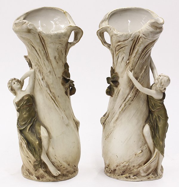 Pair of Royal Dux porcelain Art Nouveau vases: Pair of Royal Dux porcelain Art Nouveau vases, each having a naturalistic tree trunk form accented with a seated beauty, each stamped "Royal Dux, Bohemia", 16"h