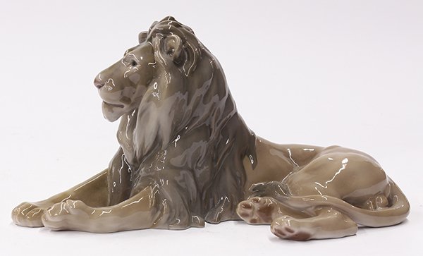 Bing & Grondahl porcelain lion: Bing & Grondahl porcelain lion, 1970-1983, the recumbent lion depicted gazing outward with a dignified expression, 7"h x 14"l. Provenance: Property from a private collection to benefit Honolulu Museum