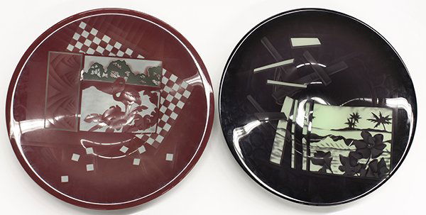 Joan Irving acid cut art glass: (lot of 2) Joan Irving acid cut art glass circa 1985, consisiting of two low bowls with scenes of tropical beaches, one in black and white and one in mauve and white, signed and dated 1985, 15.5"dia