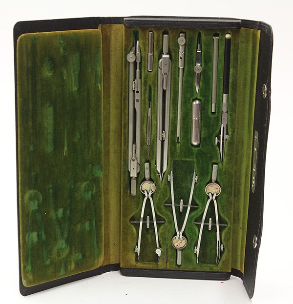 German drafting tool set by Keuffel & Esser: German drafting tool set by Keuffel & Esser, early 20th century, cased in black leather lined with green velvet, the center tray holds ten instruments including compasses and extra lead and point case