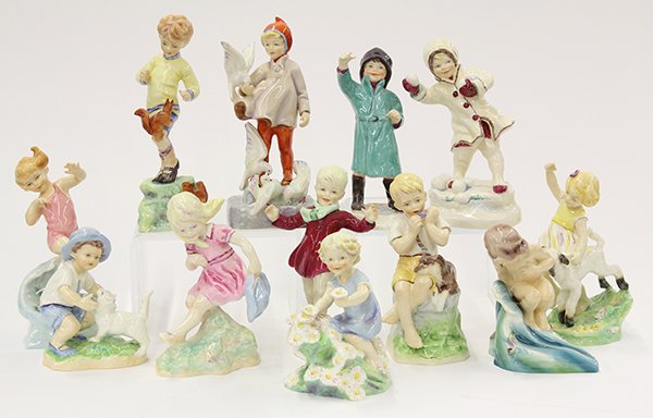Royal Worcester porcelain figurines of children: (lot of 12) Royal Worcester porcelain figurines of children depicting the months of the year, tallest: 7.75"h