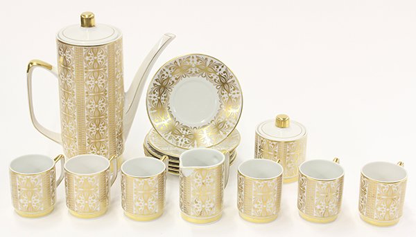 Bavarian porcelain demitasse service for six: Bavarian porcelain demitasse service for six consisting of chocolate pot, covered sugar bowl, cream pitcher, cups, and saucers, each piece gilt enameled with a repeating stylized pattern
