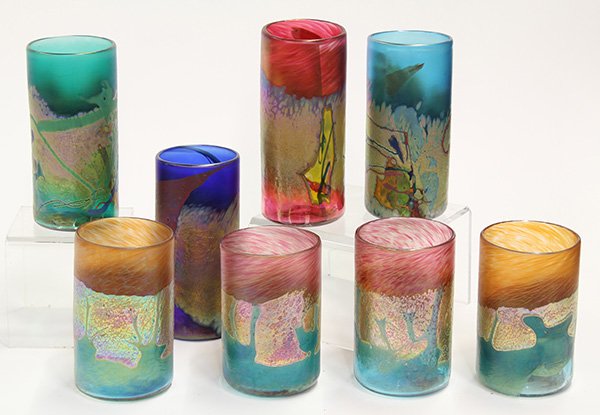 Bruce Stowell art glass tumblers: (lot of 8) Bruce Stowell art glass tumblers, consisting of four smaller examples, each depicting a naturalistic landscape on an iridescent ground, 5"h; and four larger glasses, each having polychrome 