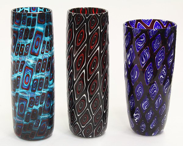 Art glass vases by Michael Nourot (American b.1949): (lot of 3) Art glass vases by Michael Nourot (American b.1949), circa 1981, each vase of cylindrical form, having repeating geometric patterns executed in the Venetian murrini technique, in multiple c