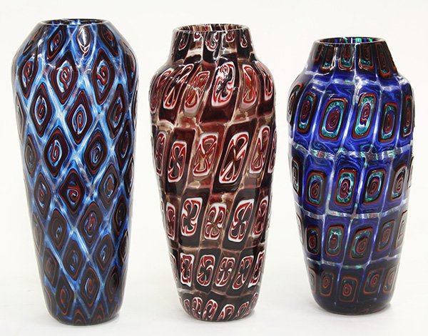 Art glass vases by Michael Nourot (American b.1949): (lot of 3) Art glass vases by Michael Nourot (American b.1949), executed 1981-1983, each vase of tapering form, having repeating geometric patterns executed in the Venetian murrini technique, in multi